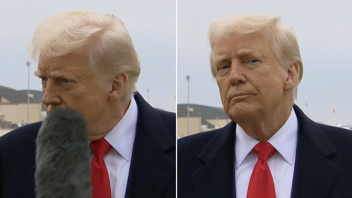 President Trump reacts to being hit with a boom mic