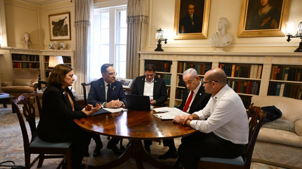 Israeli Prime Minister Benjamin Netanyahu, second from right, is shown with advisors ahead of his meeting with President Donald Trump on Feb. 4, 2025.