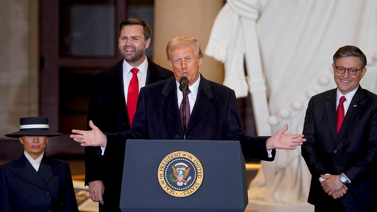 President Donald Trump behind lectern speaking on inauguration day