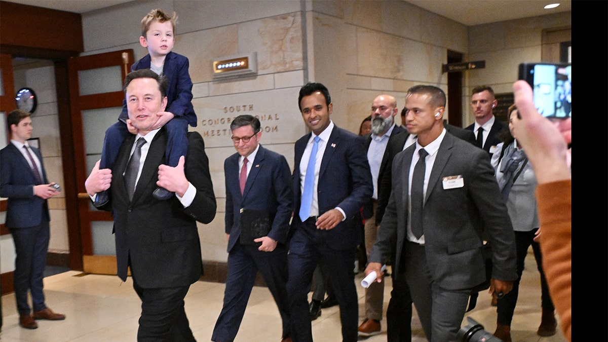 Elon Musk, left, and Vivek Ramaswamy, center, are leading the effort to cut government inefficiency.