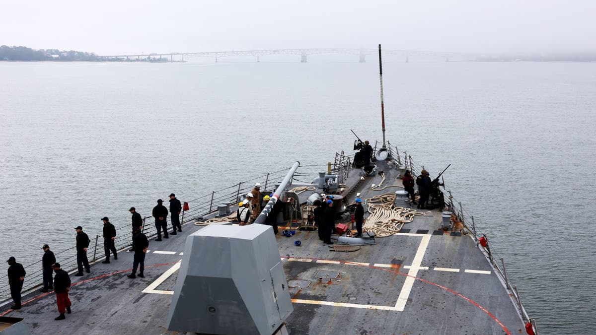 deck of USS Gravely with sailors on it