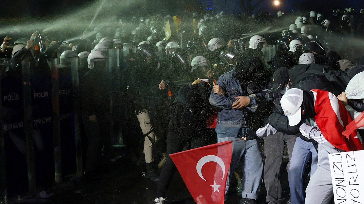 Police officers use pepper spray on demonstrators during a protest on the day Istanbul Mayor Ekrem Imamoglu was jailed as part of a corruption investigation, in Istanbul, Turkey, March 23, 2025.