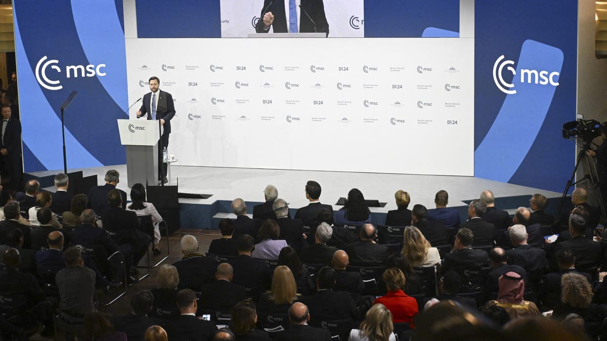 wide shot of Vice President Vance delivering speech in Munich