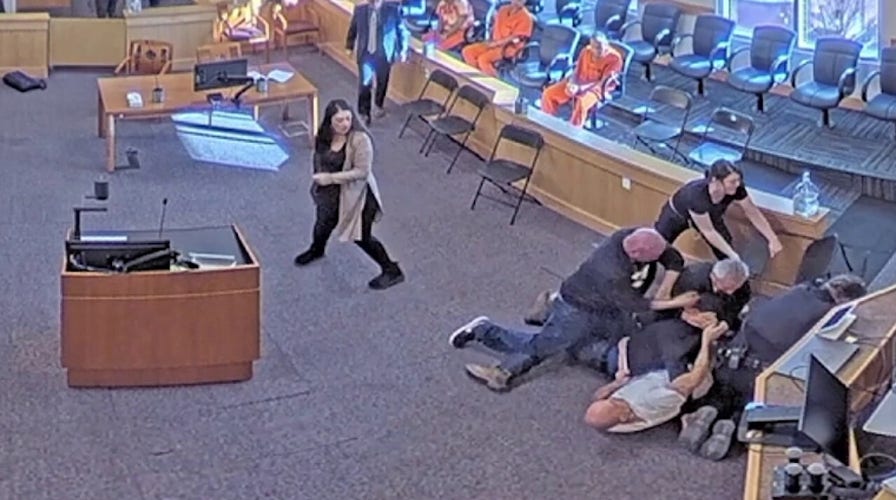 Video shows chaotic courtroom brawl during murder suspect hearing