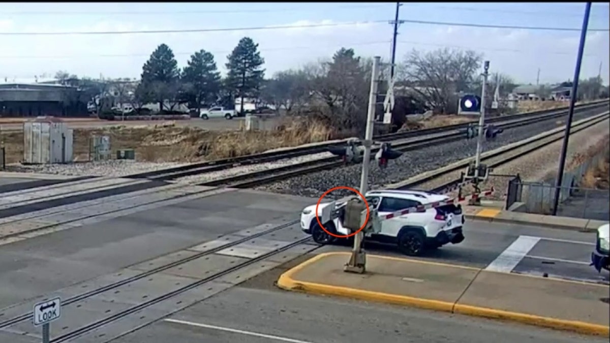 SUV stops on train tracks in Layton, Utah