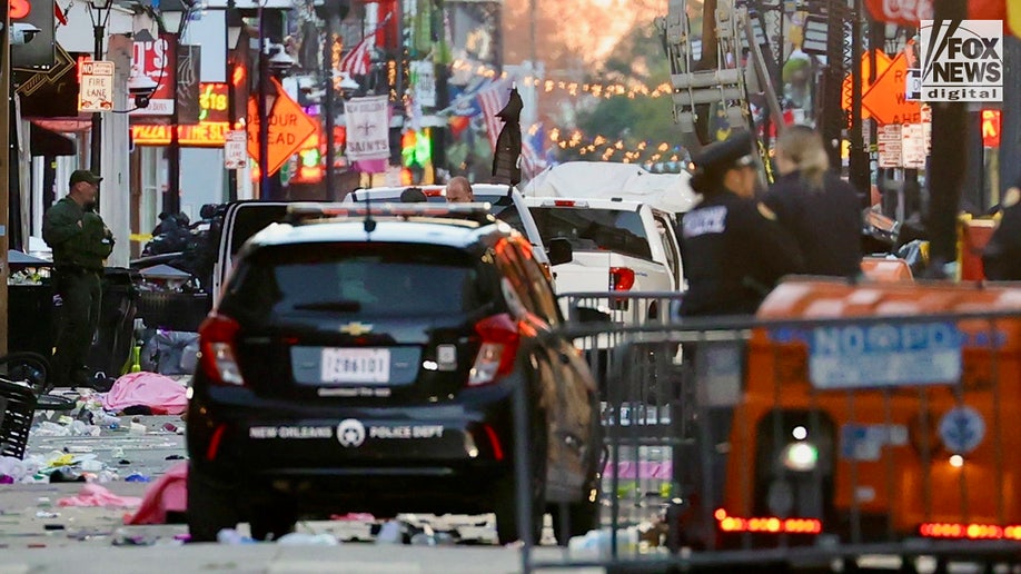 Police investigate a crime scene on Bourbon Street in New Orleans, Louisiana