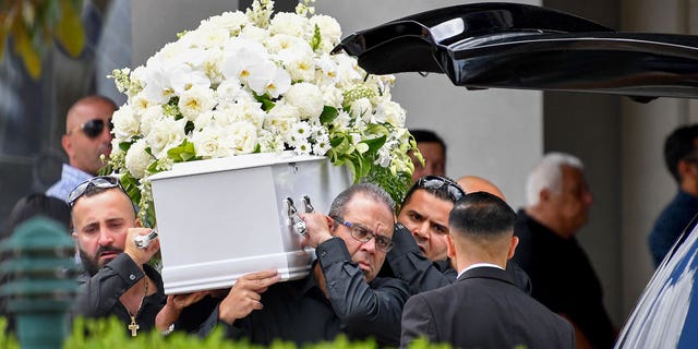 The casket of Vanessa Tadros is carried during her funeral in Sydney, on Jan. 16, 2023.