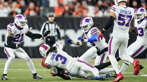 Cincinnati Bengals wide receiver Tee Higgins (85) collides with Buffalo Bills safety Damar Hamlin (3) during the first half of an NFL football game, Monday, Jan. 2, 2023, in Cincinnati.