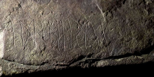 The runestone found at Tyrifjorden, Norway, is seen at the Museum of Cultural History on Jan. 12, 2023. 