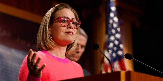 U.S. Sen. Kyrtsen Sinema, D-AZ, speaks at a news conference after the Senate passed the Respect for Marriage Act at the Capitol Building on November 29, 2022 in Washington, DC. In a 61-36 vote, the measure would provide federal recognition and protection for same-sex and interracial marriages. 