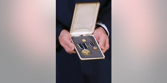 WASHINGTON, DC - FEBRUARY 15:  A 2012 Presidential Citizens Medal, the nation's second-highest civilian honor, that U.S. President Barack Obama will present to recepients is held in the East Room of the White House February 15, 2013 in Washington, DC. "Their selflessness and courage inspire us all to look for opportunities to better serve our communities and our country," Obama said about this year's recepients.  (Photo by Chip Somodevilla/Getty Images)