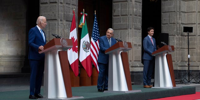 President Joe Biden and Canada Prime Minister Justin Trudeau listen to Mexican President Andres Manuel Lopez Obrador speaks during a joint news conference at the North American Leaders Summit, Tuesday, Jan. 10, 2023, in Mexico City. 