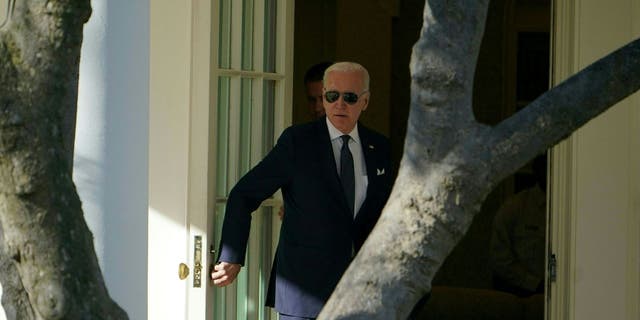 President Biden walks to the Oval Office on Jan. 16, 2023.