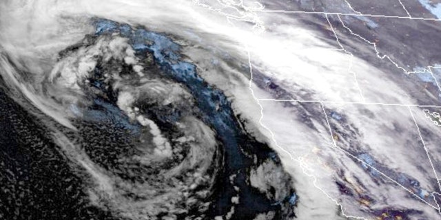 This GOES-West GeoColor satellite image made available by NOAA shows a storm system approaching along U.S. West coast at 9:16 p.m. ET, on Wednesday, Jan. 4, 2023.