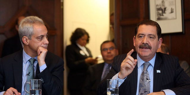 Then-Mayor Rahm Emanuel, left, and Jesus "Chuy" Garcia debate at a Chicago Tribune Editorial Board meeting on Jan. 27, 2015. 