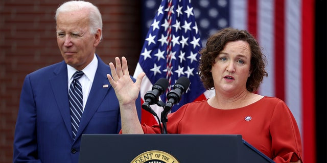 President Biden looks on as Rep. Katie Porter, D-Calif., speaks before Biden delivered remarks on lowering costs for American families at Irvine Valley College in Orange County on Oct. 14, 2022 in Irvine, California. 