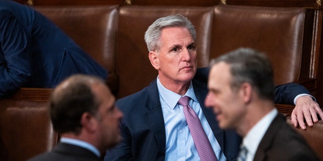 Republican Leader Kevin McCarthy, R-Calif., Reps. Scott Perry, R-Pa., right, and Andy Barr, R-Ky., are seen on the House floor after a vote in which he did not receive enough votes for Speaker of House on Friday, January 6, 2023.