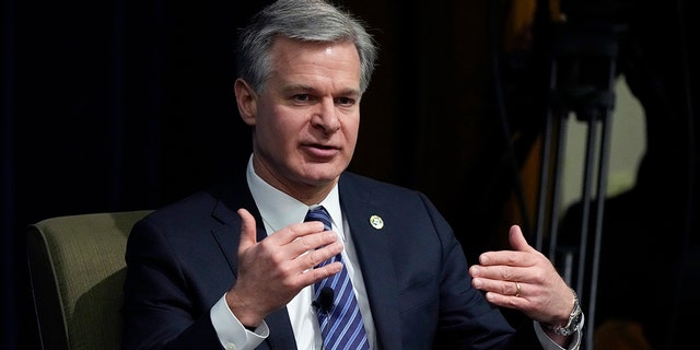 FBI Director Christopher Wray speaks at the Gerald R. Ford School of Public Policy at the University of Michigan, Friday, Dec. 2, 2022, in Ann Arbor, Mich.