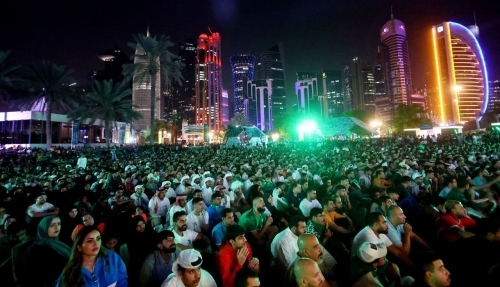 Fans in Doha, Qatar, watch the match between Poland and Saudi Arabia on November 26. 