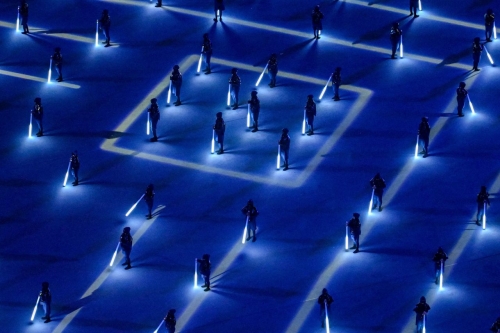 Dancers light up the ground during the opening ceremony.