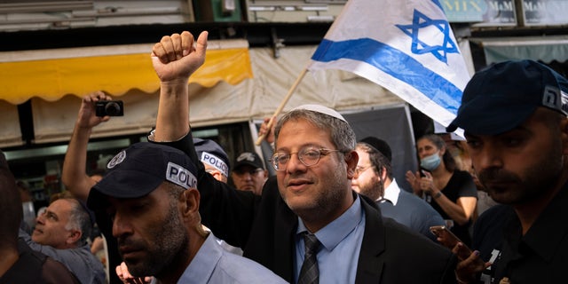 Itamar Ben-Gvir visits at Hatikva Market in Tel Aviv during his campaign ahead of the country's election, Friday, Oct. 21, 2022. Ben-Gvir is now a minister in the new Netanyahu government.