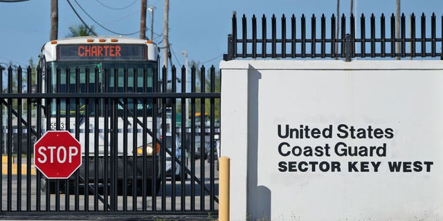 Buses carrying Cuban migrants leave from U.S. Coast Guard Sector Key West, on Jan. 5, 2023, in Key West, FL. Homeland Security officials said 337 migrants were taken by U.S. Coast Guard on Thursday.