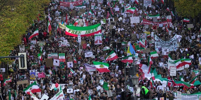 People attend a protest against the Iranian regime in Berlin, Germany, Oct. 22, 2022, following the death of Mahsa Amini while she was in the custody of the Islamic republic's notorious "morality police."