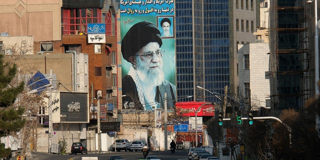 A huge mural of Ayatollah Seyyed Ali Khamenei, Iran's supreme leader, painted next to a smaller one of Ayatollah Ruhollah Khomeini on Motahari Street on March 8, 2020, in Tehran, Iran.