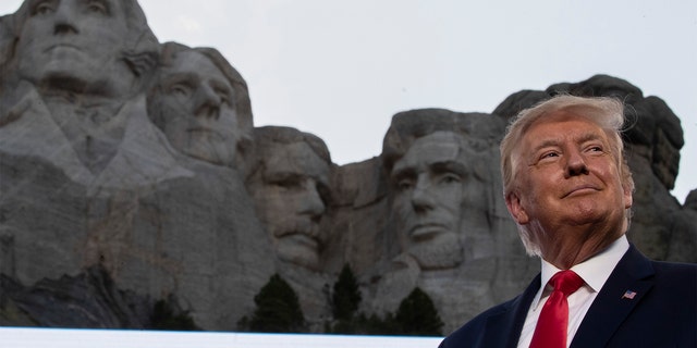 President Donald Trump smiles at Mount Rushmore National Memorial, July 3, 2020, near Keystone, South Dakota. (AP Photo/Alex Brandon)