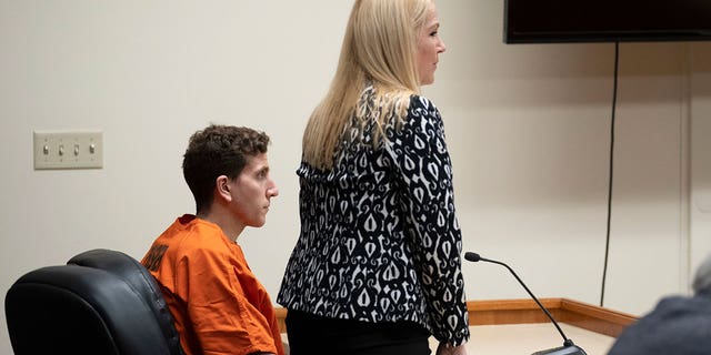 Bryan Kohberger, left, who is accused of killing four University of Idaho students on Nov. 13, 2022, looks on as his attorney, public defender Anne Taylor, right, speaks during a hearing in Latah County District Court, Thursday, Jan. 5, 2023, in Moscow, Idaho. (AP Photo/Ted S. Warren, Pool)