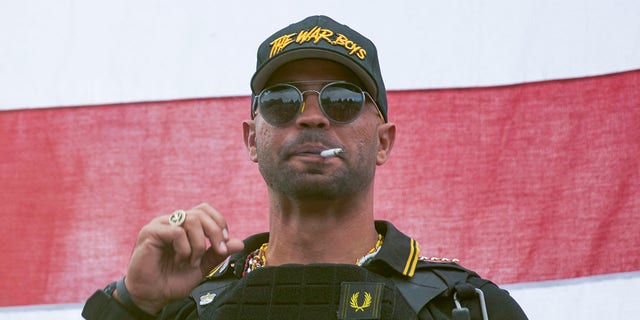 Proud Boys leader Henry "Enrique" Tarrio wears a hat that says The War Boys during a rally in Portland, Ore., on Sept. 26, 2020. 