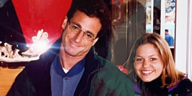 Bure shared a series of photos of her and Bob Saget together.