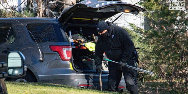 Police/investigators bringing equipment into Walshe home at 516 Chief Justice Cushing Highway, Cohasset, MA, after Brian Walshe and children departed.