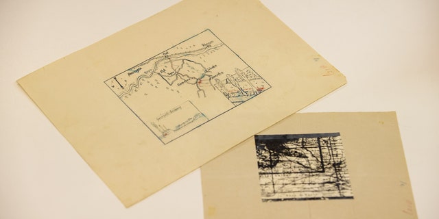 Treasure maps to a possible Nazi treasure in Ommeren are displayed in the National Archives during the annual Open Access Day in Hague, Netherlands, Jan 3, 2023.