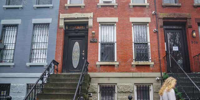 New York City Mayor Eric Adams' Brooklyn townhouse is pictured on Dec. 7, 2022. Adams is contesting a $300 fine issued by his own administration over a rat infestation at the building he owns in Brooklyn. 