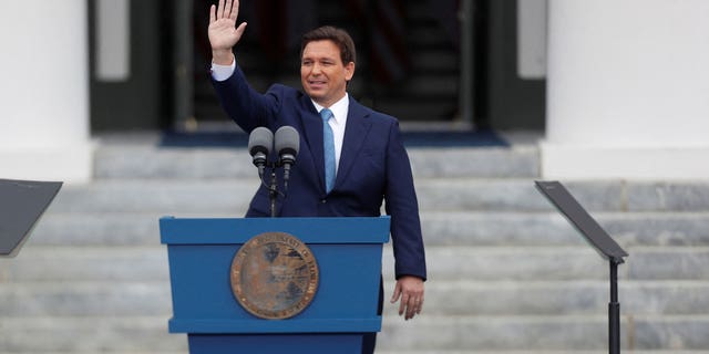 Florida's Governor Ron DeSantis after taking the oath of office waves to those in attendance at his second term inauguration in Tallahassee, Florida, Jan. 3, 2023.