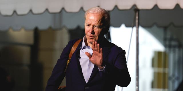 President Biden walks to speak to reporters as he and first lady Jill Biden leave the White House and walk to Marine One on the South Lawn Dec. 27, 2022, Washington, D.C.