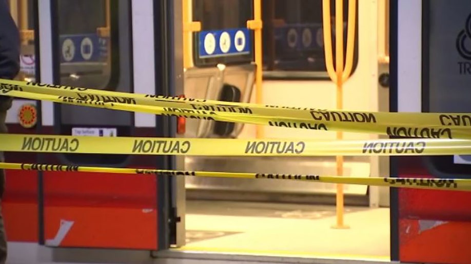 crime scene tape on train platform