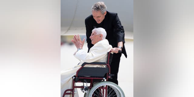 22 June 2020, Bavaria, Freising: Georg Gänswein (above), Benedict XVI's private secretary, and Pope Benedict XVI emeritus stand together at Munich Airport for a photo. The Pope emeritus travels back to the Vatican after his four-day visit to Regensburg. The former Pope had made a surprise visit to his old home on 18.06.2020 to visit his 96 year old brother. Photo: Sven Hoppe/dpa (Photo by Sven Hoppe/picture alliance via Getty Images)