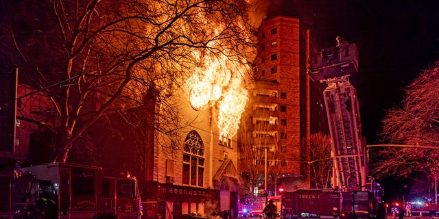 Flames pierce through Old Portland Korean Church. 