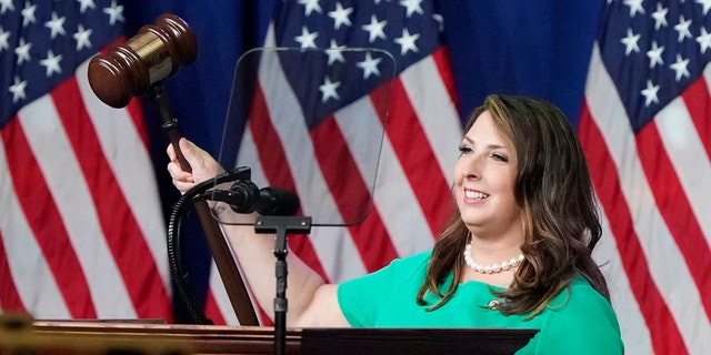 Republican National Committee Chairwoman, Ronna McDaniel, gavels the call-to-order at the opening of the first day of the Republican National Convention Monday, Aug. 24, 2020, in Charlotte, N.C. (AP Photo/Chris Carlson)