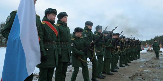 Cadets of a military academy fire a salute during the funeral of Dmitry Menshikov, a mercenary for the private Russian military company Wagner Group, killed during the military conflict in Ukraine, in the Alley of Heroes at a cemetery in Saint Petersburg, Russia December 24, 2022. 