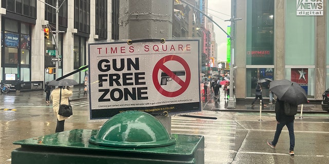 A sign declares that Times Square in New York City is a gun-free zone, Sept. 6, 2022.