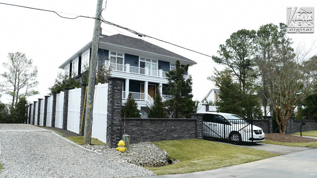 Biden is building a beach house wall.