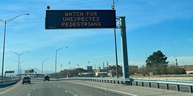 Signs in El Paso Texas, warn motorists of "unexpected pedestrians."