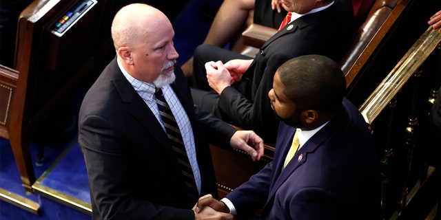 Rep.-elect Chip Roy, R-Texas, talks to Rep.-elect Byron Donalds, R-Fla., in the House Chamber during the second day of elections for Speaker of the House at the U.S. Capitol Building on Jan. 4, 2023, in Washington, D.C. 