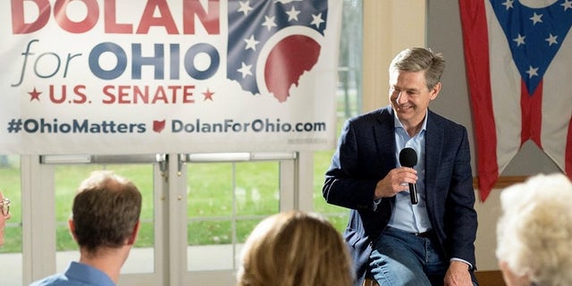 State Sen. Matt Dolan, who's running for the GOP U.S. Senate nomination for a second straight cycle, campaigns in Independence, Ohio, on Dec. 1, 2021.