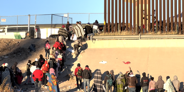 Migrants at the front of the line are processed for entry by U.S. Customs and Border Protection in El Paso, Texas. 