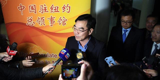 Huang Ping, new Chinese consul-general in New York, speaks at a press briefing upon his arrival at New York's John F. Kennedy International Airport, the United States, on Nov. 15, 2018.