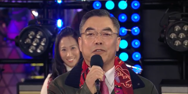 Huang Ping, the consul general of China’s New York Consulate, delivers remarks at the Times Square’s New Year’s Eve "Hong Kong Rocks!" event in New York City on Saturday, Dec. 31, 2022.